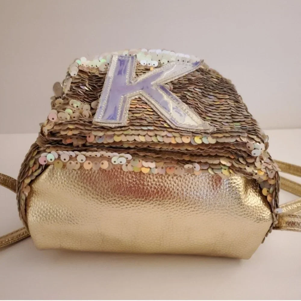 justice store mini backpacks letter k Liberty of London Personalised Name Backpack Maisonette State Bags Kane metallic backpack for kids ages 48 Flip Sequin Letter N mini
